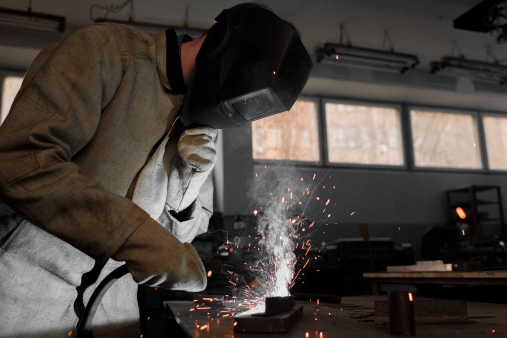 Manufacture worker welding metal with sparks at fa lrnsrs7 1 | page